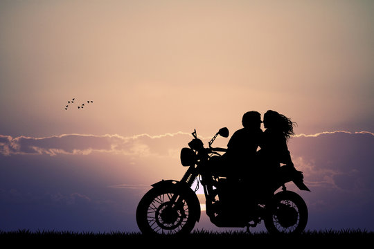 Fototapeta couple kissing on motorbike