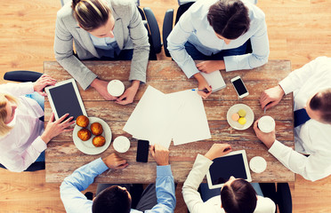 close up of business team drinking coffee on lunch