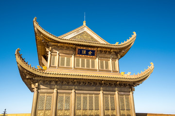 Fototapeta premium A golden temple at the top of the Emei Mountain -Sichuan, China