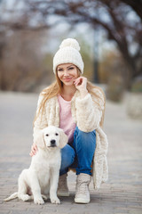 The girl in the park with his beloved dog