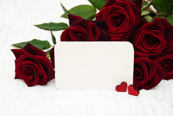 Red roses and greeting card