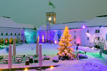 Ljubljana, Slovenia - January 3, 2016. Inner yard of Ljabljana castle covered with snow in festive...