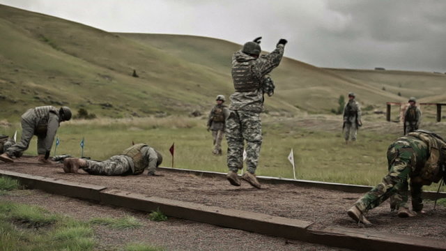 Soldiers doing push ups during drills