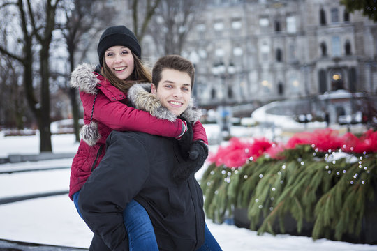 Image of affectionate couple in park on winter season