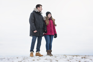 Two teenagers havinf fun on the snow field