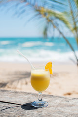 orange juice on the beach