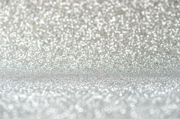 Glitter and lights. Shiny silver background