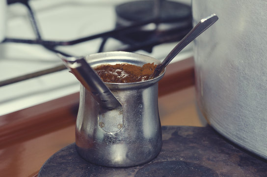 Coffee making in a traditional Albanian home. Selective focus