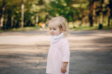 young family walking in the park
