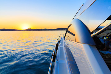 Obraz na płótnie Canvas luxury motoryacht at sunset