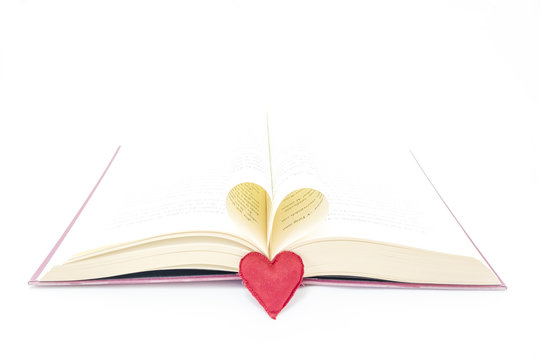 open book and forming a heart with their central leaves