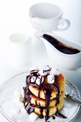 Syrniki cheese pancakes with sour cream 