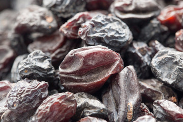 Black raisins as background. macro