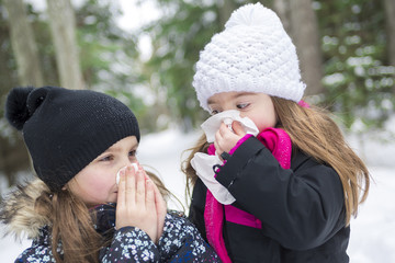childs with tissue outside in forest winter season