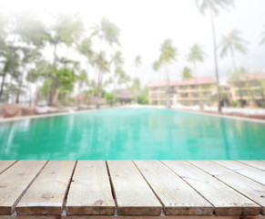Wood Table Top of Background and Pool