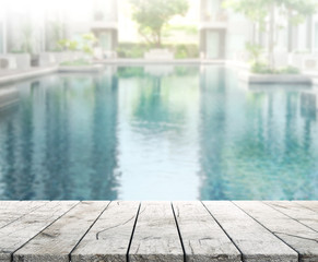 Wood Table Top of Background and Pool