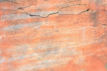 Texture of a cement salmon pink wall