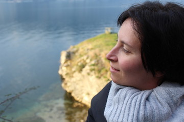 woman's face with background water