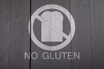 Gluten free bread sign on black wooden background