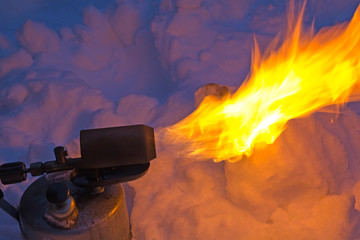 Old torch with a flame