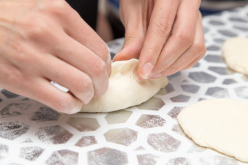 cooking cakes of the dough in the kitchen