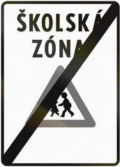 Road sign used in Slovakia - End of school zone. Skolska zona means school zone