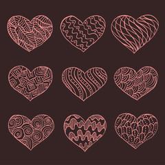 Fototapeta na wymiar Set of hand drawn hearts. Ornate ink drawing. Vector illustration.
