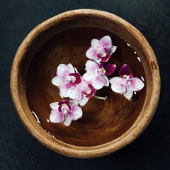 Spa background with floating flowers