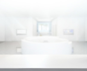 Obraz na płótnie Canvas Table Top And Blur Office Of Background