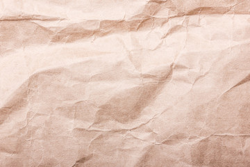 Crumpled retro brown paper texture.