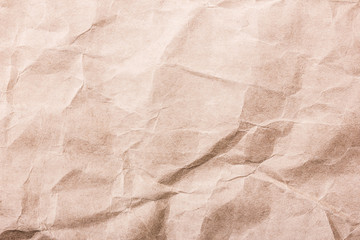 Crumpled retro brown paper texture.