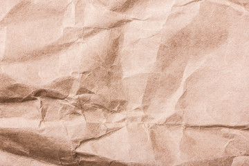 Crumpled retro brown paper texture.