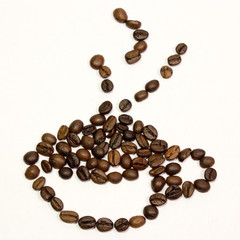 a cup of coffee from beans on white background