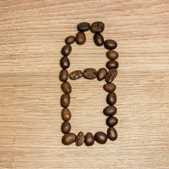 battery is made from coffee beans on a wooden table