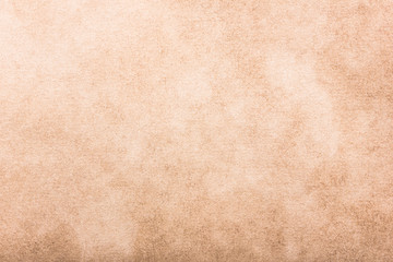 Grunge burned brown paper background.