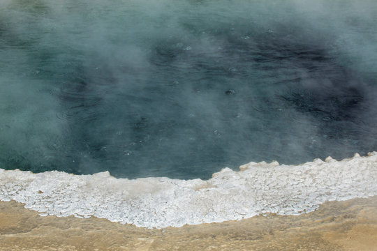 Bubbling, steaming, boiling aqua water in Yellowstone Park, Wyoming.