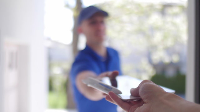 Delivery guy customer POV rack focus