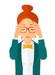 Repentant woman clutching her head.