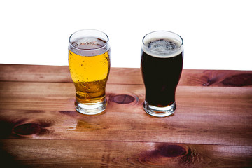 Dark and light beer on the bar on a white background