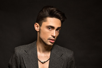 Obraz premium Model man isolated on black background