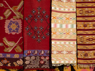 Four hanged handmade traditional wool rugs