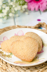 Heart-shaped butter cookies with sugar.