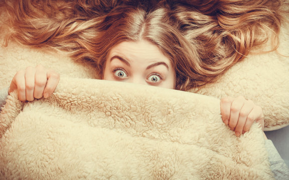 Woman Waking Up Under Wool Woolen Blanket.