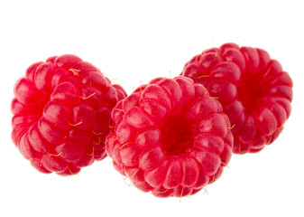 ripe raspberries isolated on white background close up