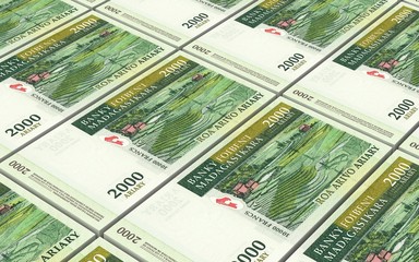 Malagasy ariary bills stacks background. Computer generated 3D photo rendering.