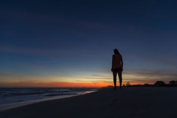 Fototapeta na wymiar girl and caribbean sunset