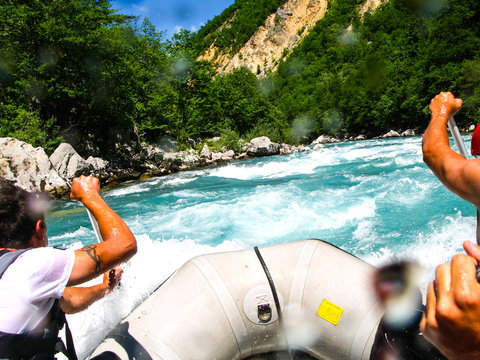 rafting boat on the fast mountain river