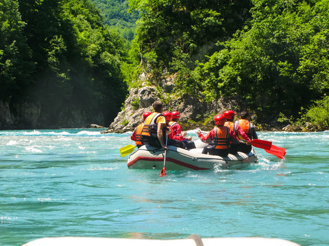rafting boat on the fast mountain river