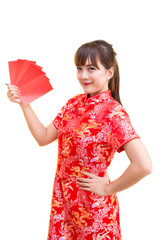Happy chinese new year,Cute smiling Asian woman dress traditional cheongsam and qipao holding red envelopes ang pow or red packet monetary gift card on white isolated background