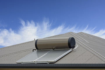 solar panel with blue sky and clouds